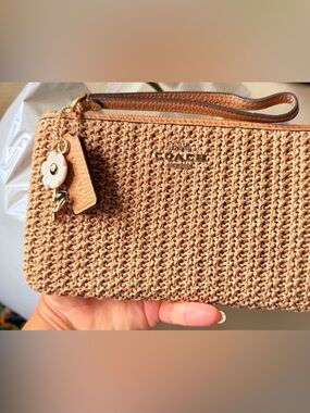Coach Woven Tan Wristlet with Floral Charm